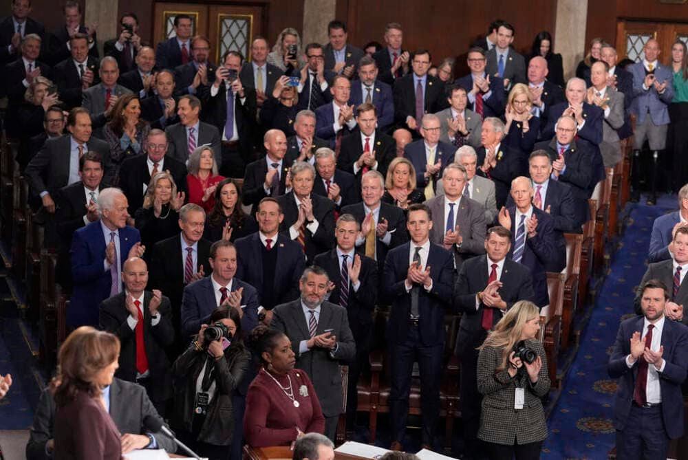 House Republicans applaud the election of Donald Trump, including Vice President-elect JD Vance, lower right, at a joint session of Congress to confirm the Electoral College votes, affirming President-elect Donald Trump's victory in the presidential election, Monday, Jan. 6, 2025, at the U.S. Capitol in Washington. (AP Photo/J. Scott Applewhite)